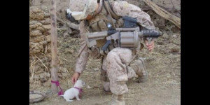 Soldier with tiny doggy