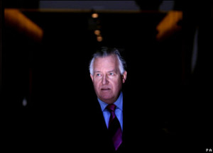 Peter Hain talks to reporters outside Caxton House after he tendered