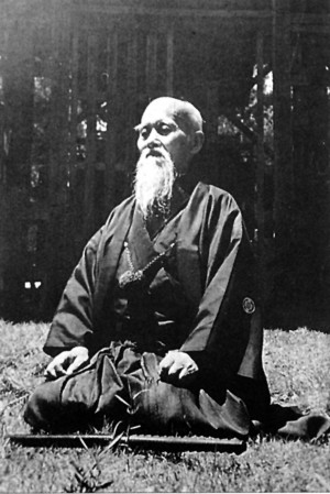 Aikido founder, Morihei Ueshiba Sensei, sitting in meditation (zazen).