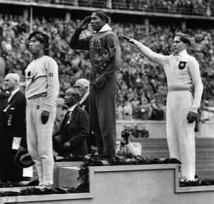 hero Jesse Owens taking gold at the 1936 Berlin Olympics after Hitler ...