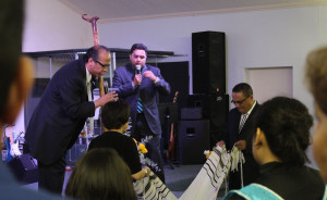 Jose Esparza sows a seed for the church by giving Pastor JR Rodriguez ...
