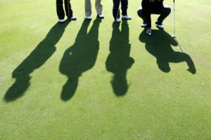 Golfers on the golf pitch. - Jochen Tack/ arabianEye/ Getty Images