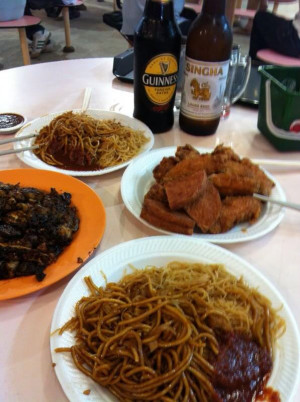 ... uncle around age 50-60 queuing up at hawker centre for Chicken wings