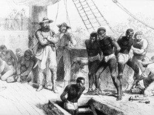Africans being forced below deck before transportation to
