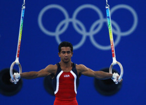 on the on rings in the men's team final of the artistic gymnastics ...