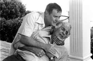 american actor jim davis is held by american actor larry hagman as